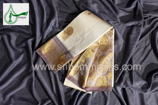 Cream Colour One Side Pure Silk Saree with border feet butta and rich pallu