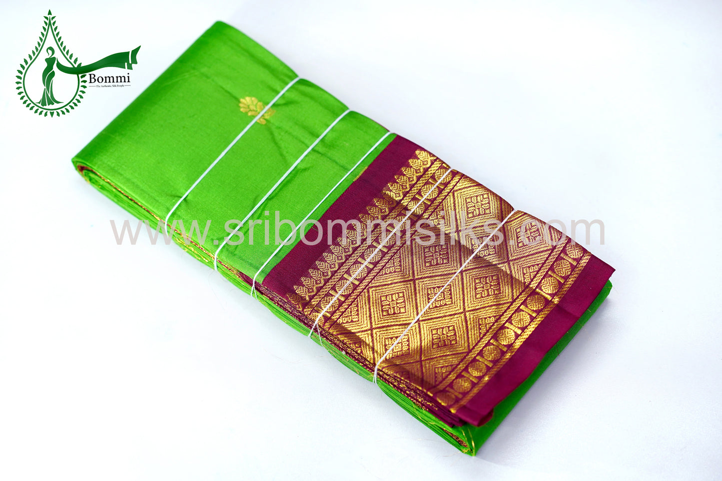 Lotus Leaf Green Color Kanchipuram Korvai Traditional One Side Pure Silk Saree with Crimson Red Contrast Border Rich Pallu and small fancy butta